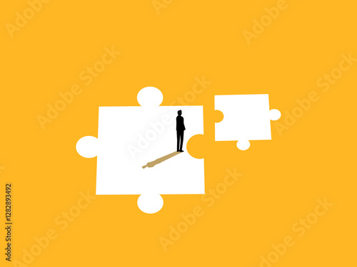 Businessman on mismatched small and large jigsaw pieces