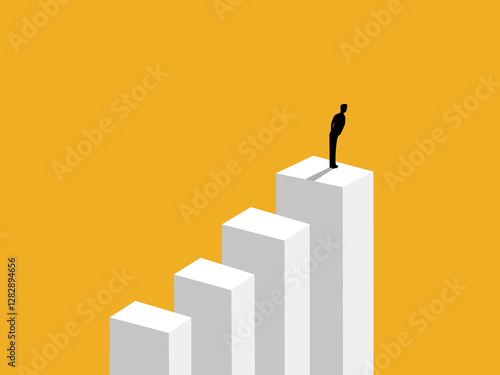 Successful businessman standing on a higher bar graph