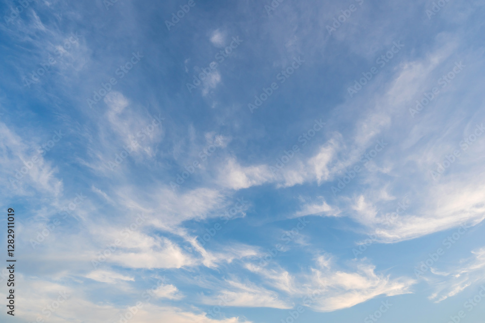 Obraz premium white fluffy clouds with the beautiful blue sky