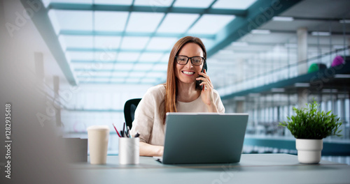 Free Download Busy woman managing phone and laptop - GFXLoad