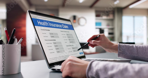 Slika na platnu Woman filing medical insurance claim form online