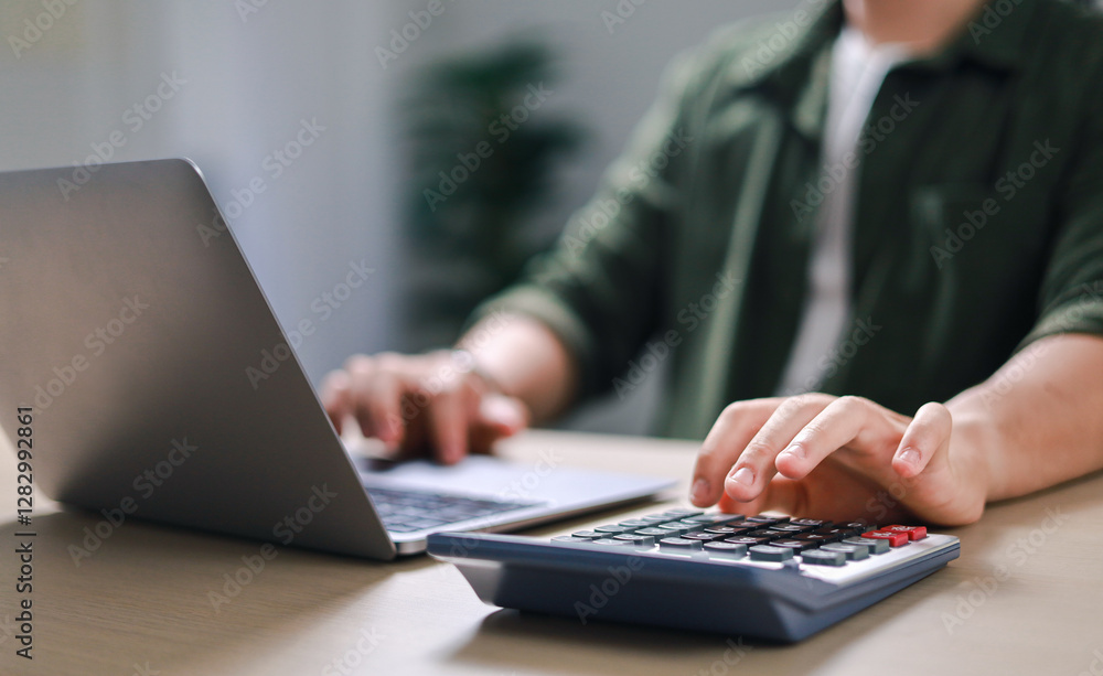 Businessman Calculate Budget, Report and Financial Analysis Calculator of Business, Calculate Tax, Income and Expense. Businessman Calculate Budget, Report and Financial Analysis Calculator of Business, Calculate Tax, Income and Expense.