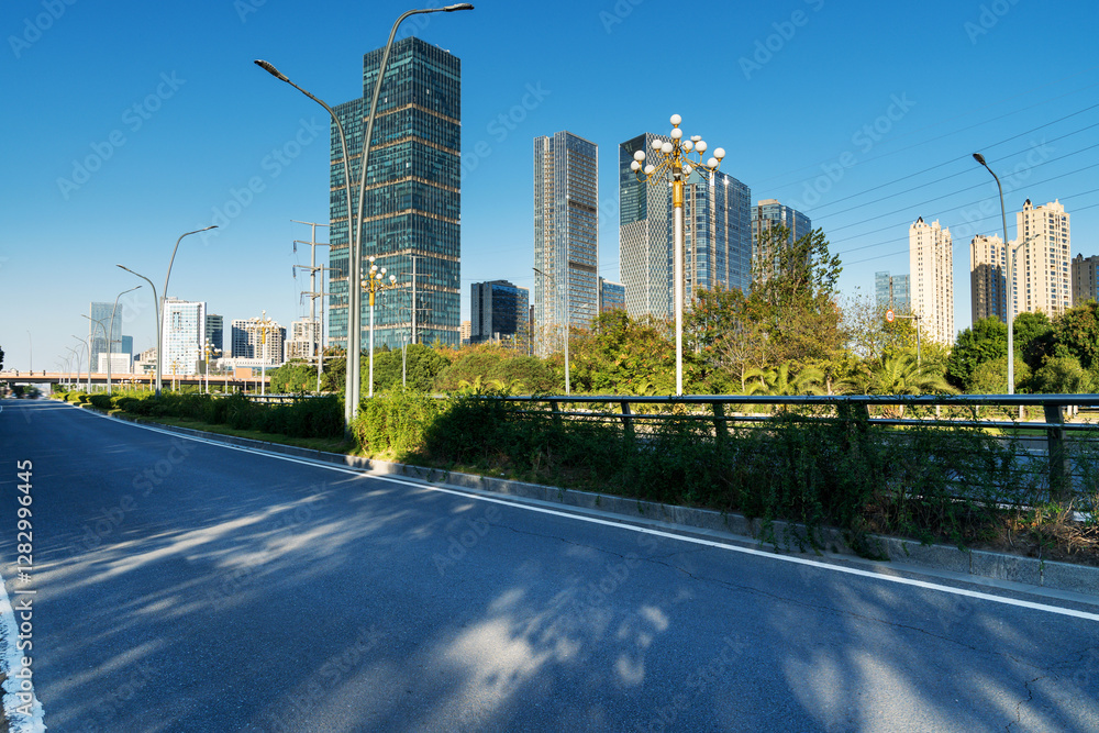 Empty urban road and buildings in the city Empty urban road and buildings in the city