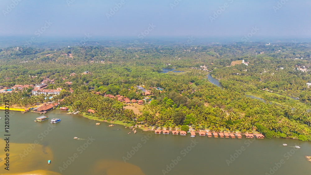 Fototapeta premium Drone View of Poovar Island: Where the River Meets the Sea