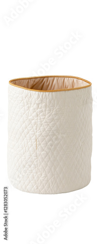 Soft quilted fabric storage basket with a diamond-stitched pattern and gold trim, isolated on a white background. Ideal for home organization. photo