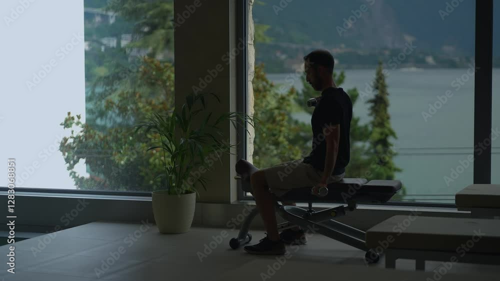 A Contemplative Moment Observed in a Modern Fitness Space That Inspires Serenity and Growth A Contemplative Moment Observed in a Modern Fitness Space That Inspires Serenity and Growth