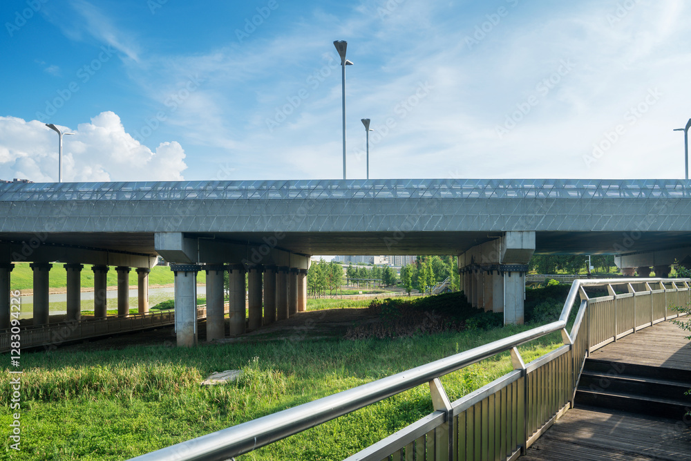 Concrete structure and asphalt road space under the overpass in the city Concrete structure and asphalt road space under the overpass in the city