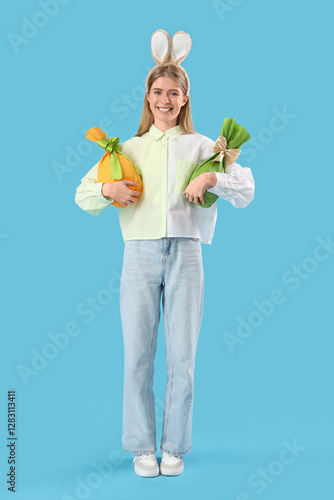 Young woman in bunny ears w...