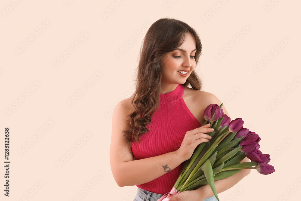 Pretty young woman with bouquet of beautiful purple tulips on beige background Pretty young woman with bouquet of beautiful purple tulips on beige background