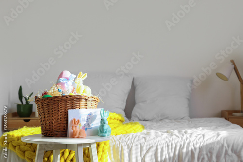 Basket with Easter eggs, to...