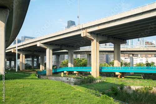 Highway overpass modern city skyline background
