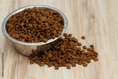 Wallpaper Mural Detail of bowl with pet food inside. Food bowl and scattered granules around wooden table. Flat lay. Torontodigital.ca