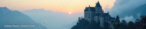 Majestic castle silhouetted against misty sky, stone, mountains, clouds