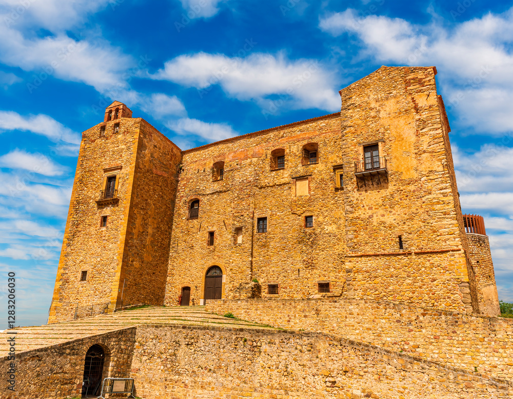 wonderful view at ancient medieval old castle or fortress in traditional Norman style with antuqoe walls and towers with beautiful blue cloudy sky on background of landscape wonderful view at ancient medieval old castle or fortress in traditional Norman style with antuqoe walls and towers with beautiful blue cloudy sky on background of landscape