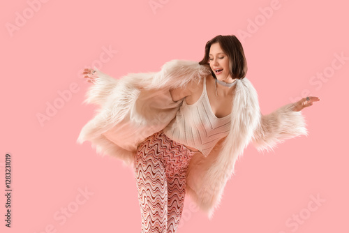 Stylish young woman in fur ...