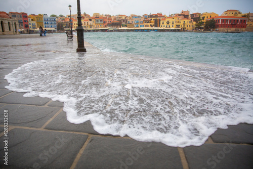 Splashes of sea against the background of the old town.
Bench in front of the lighthouse,
Faros - lighthouse in Chania