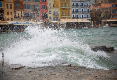 Splashes of sea against the background of the old town.
Bench in front of the lighthouse,
Faros - lighthouse in Chania