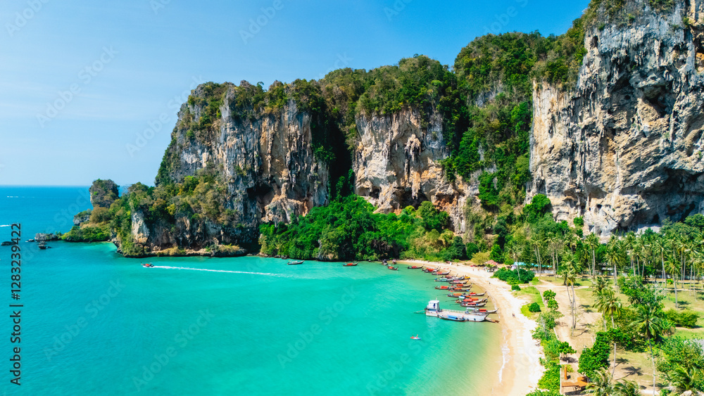 Fototapeta premium Explore the stunning beauty of Railay Beach in Krabi Thailand on a sunny day