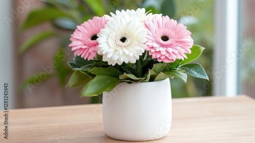 Wallpaper Mural Pink and white gerbera daisies in a pot on a wooden table Torontodigital.ca