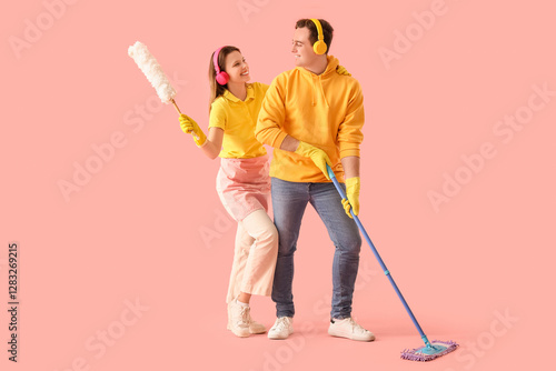 Young couple in headphones ...