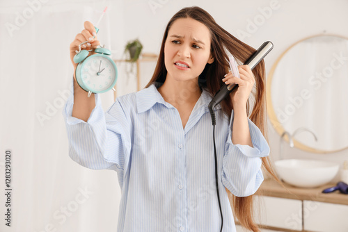 Hurrying young woman with a...