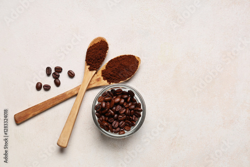Bowl of coffee beans with s...
