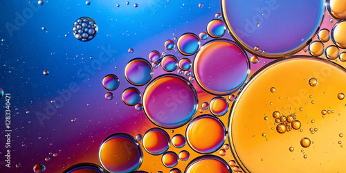 Wallpaper Mural  Colorful oil bubbles floating in liquid with a mix of blue, purple, and yellow tones creating an abstract and mesmerizing effect Torontodigital.ca