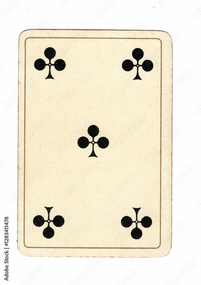 An antique clubs playing card on a white background. An antique clubs playing card on a white background.