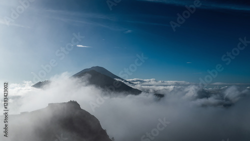 Over the clouds on Batur Volvano mountain on Bali photo