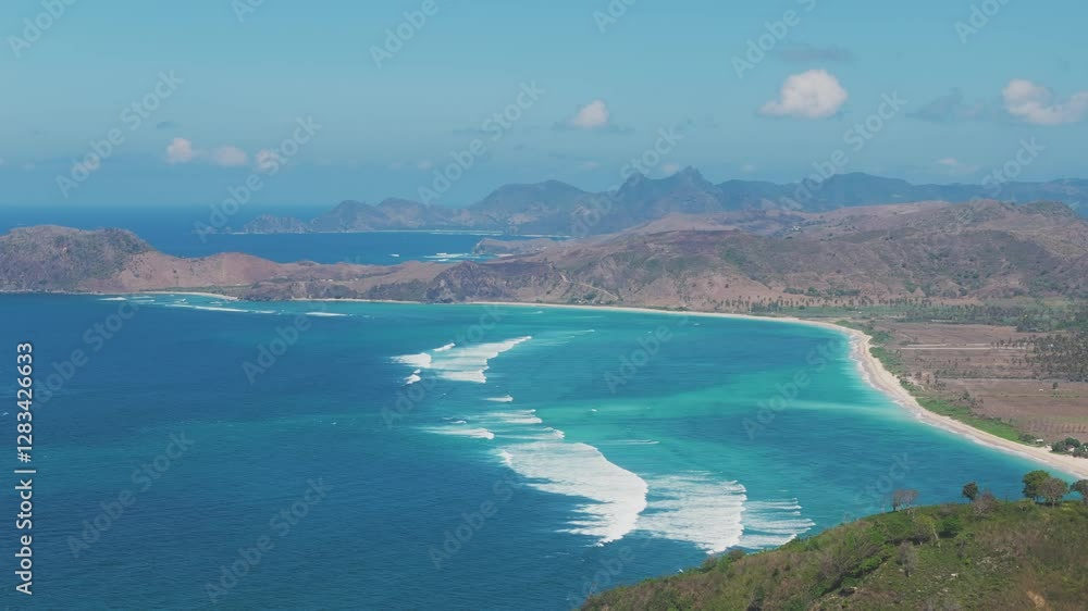 Aerial view of coastline with turquoise waters in Lombok, Indonesia Aerial view of coastline with turquoise waters in Lombok, Indonesia