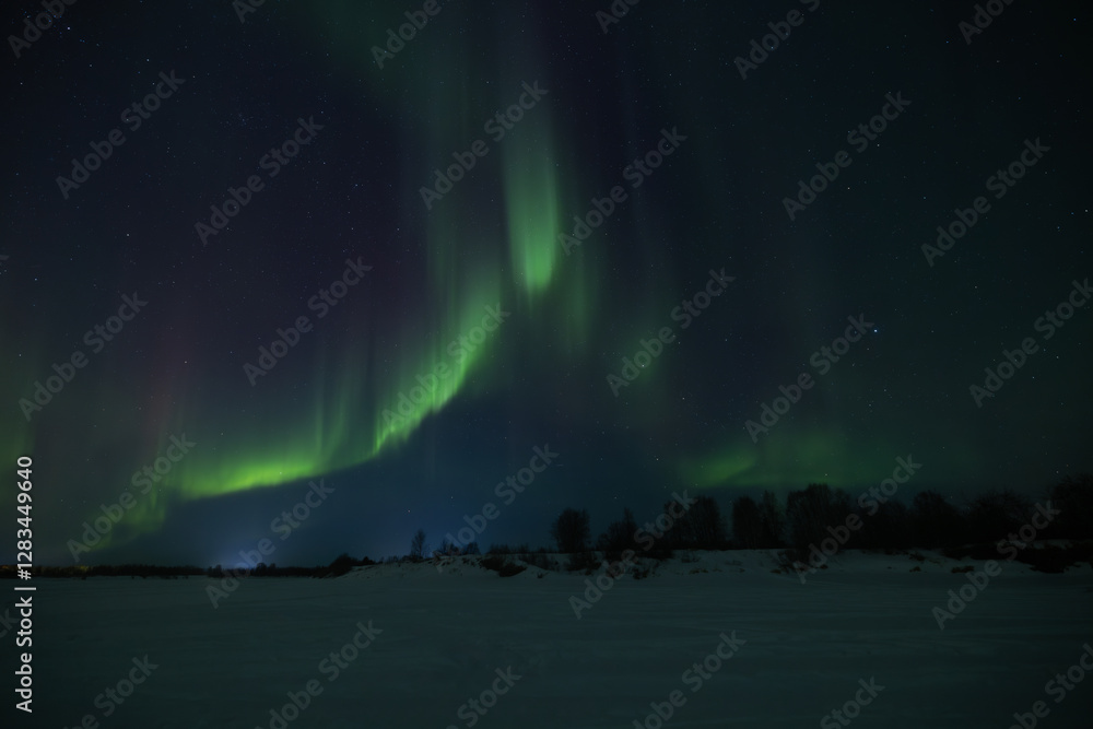 Northern lights or Aurora borealis in the sky. Kittilä, Levi in Finland Northern lights or Aurora borealis in the sky. Kittilä, Levi in Finland