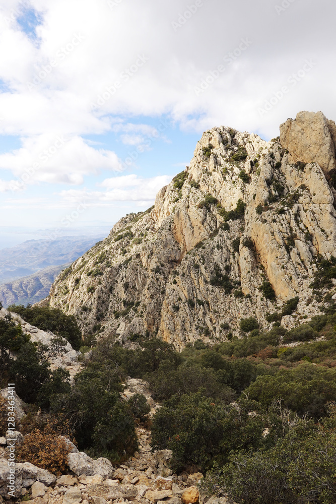 The mountain panorama opening from the hiking path to pick Puig Campana, Finestrat, Benidorm, Spain The mountain panorama opening from the hiking path to pick Puig Campana, Finestrat, Benidorm, Spain