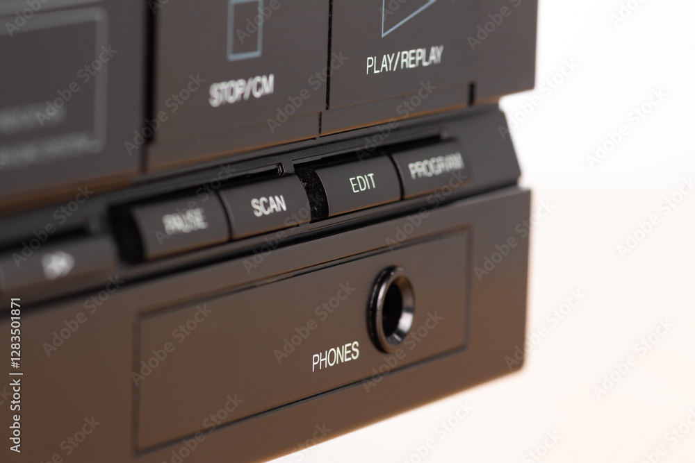 Fototapeta premium Close-Up of Vintage Audio Equipment Control Panel With Buttons and Headphone Jack