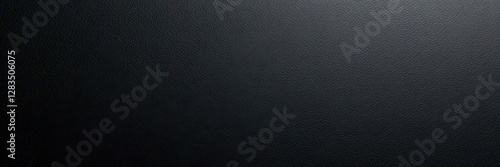 Smooth black leather texture with subtle grain and sheen on a dark background, texture, fashion