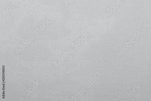 White cement wall in retro concept. Background for wallpaper or graphic design. Blank plaster texture in vintage style.