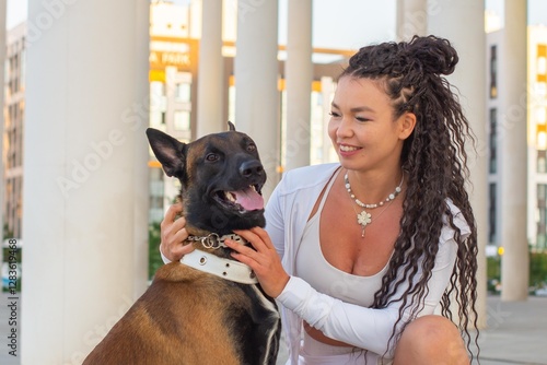 One girl with a Malinois dog