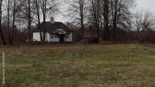 Mena Chernihiv region - Ukraine - 19 NOVEMBER 2023 - Ukraine: Bell ringing before service in church. Priest rings the bell before service in church. Orthodox Church in Mena town Chernihiv region.