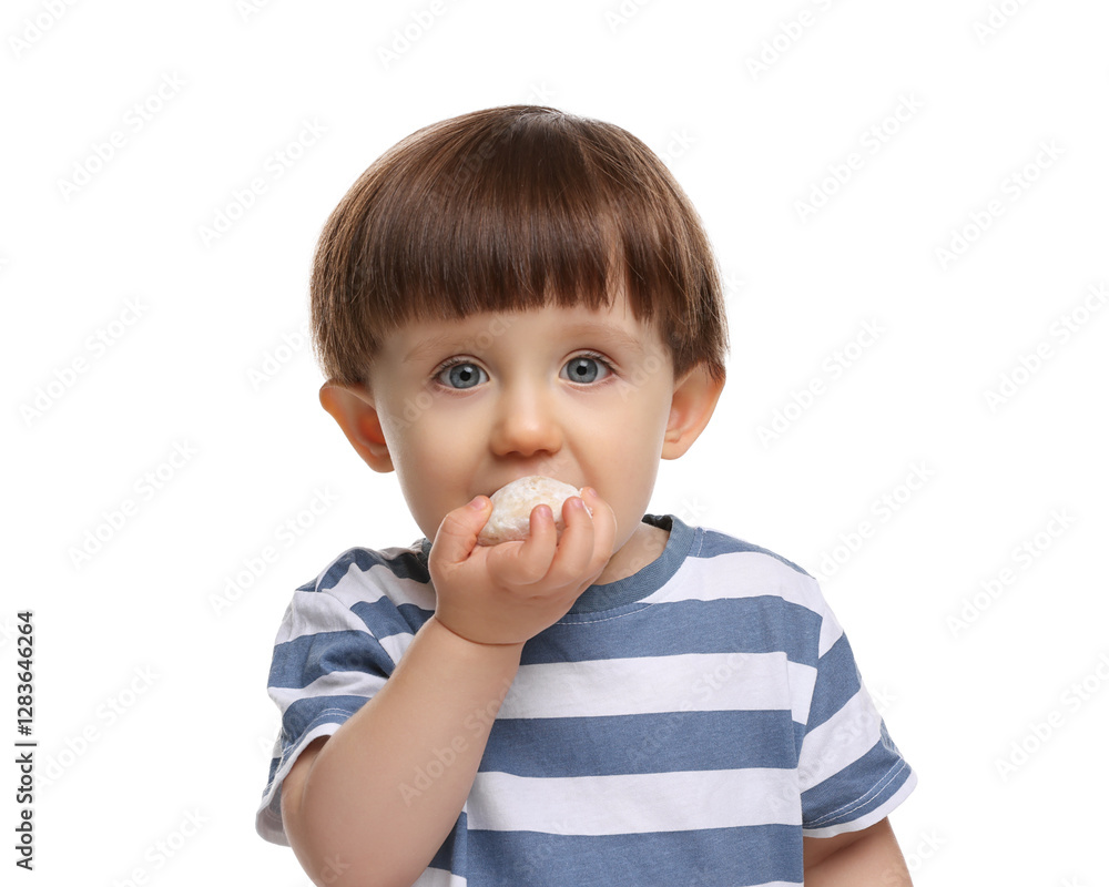 Cute little child eating tasty mochi on white background Cute little child eating tasty mochi on white background