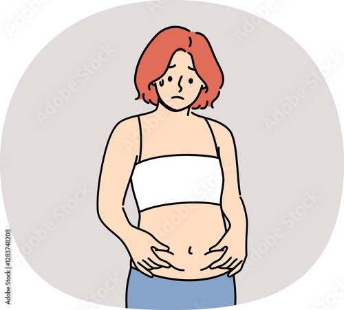 Woman is frightened by appearance of belly fat and afraid of gaining excess weight after changing diet. Thin girl thinks she has become fat, suffering from psychological problems and low self-esteem