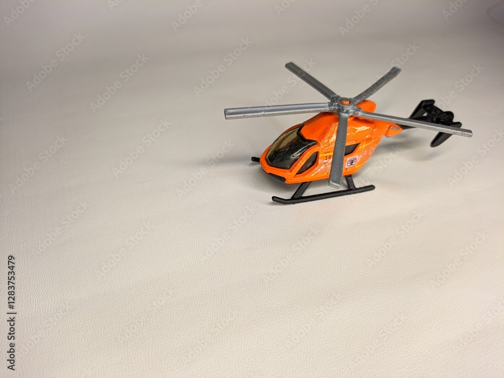 Classic toy helicopter icon, depicting a charming aircraft with spinning rotors. Suitable for a variety of projects, including childhood, toys, and transportation-themed designs Classic toy helicopter icon, depicting a charming aircraft with spinning rotors. Suitable for a variety of projects, including childhood, toys, and transportation-themed designs
