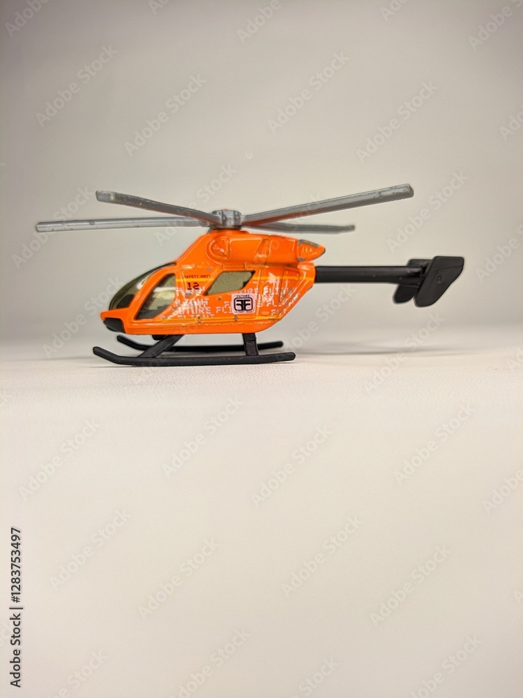 Classic toy helicopter icon, depicting a charming aircraft with spinning rotors. Suitable for a variety of projects, including childhood, toys, and transportation-themed designs Classic toy helicopter icon, depicting a charming aircraft with spinning rotors. Suitable for a variety of projects, including childhood, toys, and transportation-themed designs