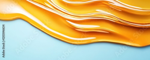 Golden honey dips flowing gracefully on a light blue background, showcasing the rich texture and natural sweetness of honey, healthy eating concept