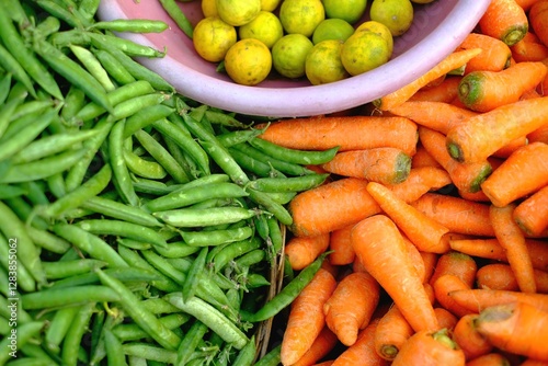 Fresh vegetables Carrot and peas. concept vegetables background. Top view.