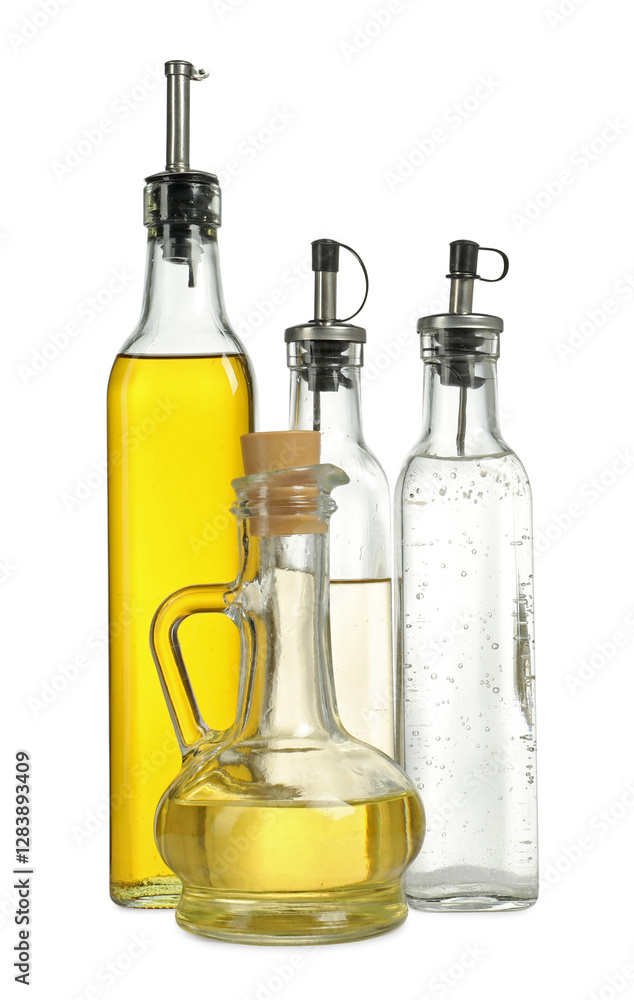Oil and vinegar in bottles isolated on white Oil and vinegar in bottles isolated on white