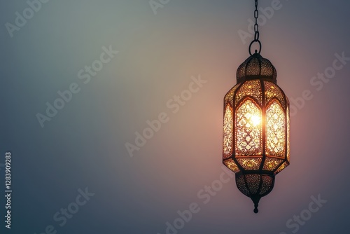 An Ornate Lantern Hanging Against A Dark Evening Backdrop