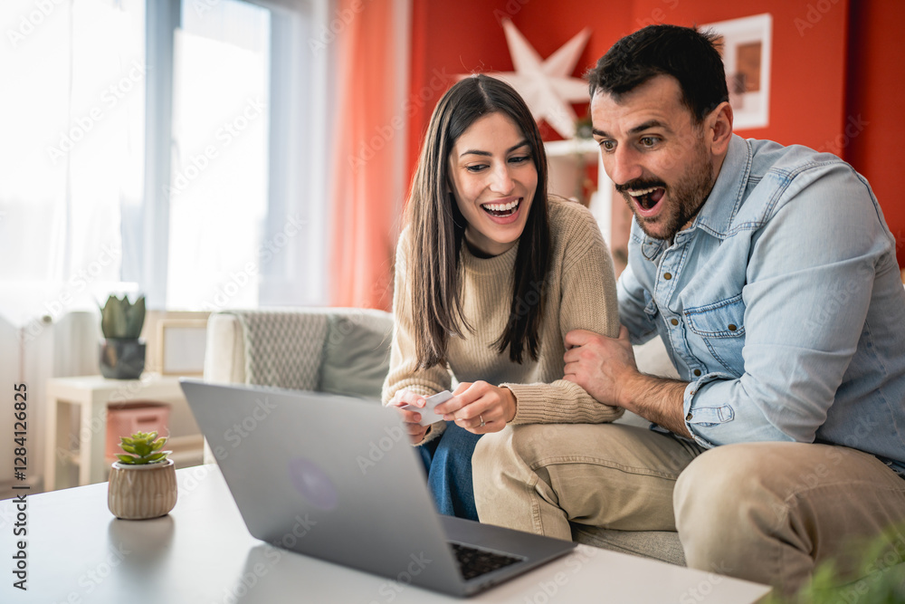 man and woman use credit card and laptop for online shopping at home man and woman use credit card and laptop for online shopping at home