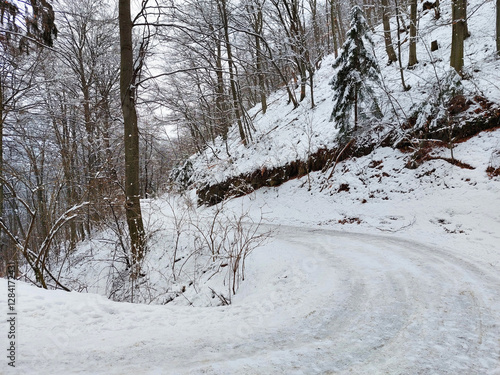 Slovenia. Curved road under snow at Pohorje mountain. Winter Europe