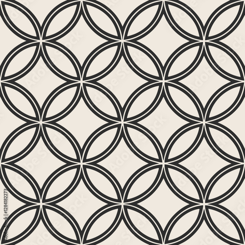 Geometric Harmony: An abstract design features a repeating pattern of interconnected circles, with a neutral backdrop enhancing its sophisticated simplicity.