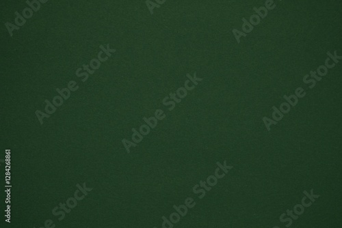 Dark green monotone background. Dark green paper.