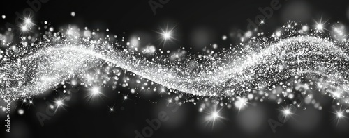 Sparkling silver wave with twinkling stars against black background